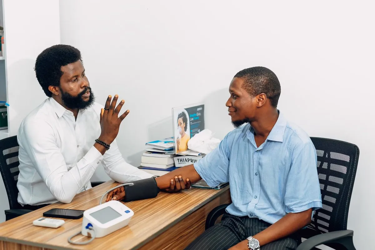 Prev Med clinician in consultation with a patient
